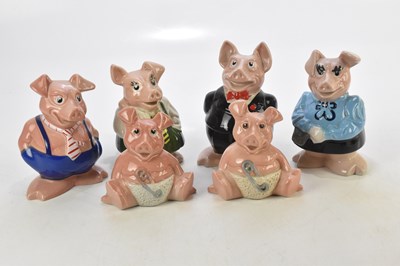 Lot 1796 - WADE; a set of NatWest pigs comprising of...