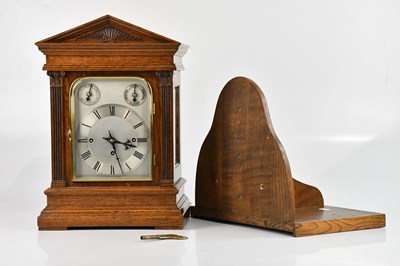 Lot 376 - A 19th century carved oak repeating bracket...