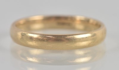 Lot 1358 - A 9ct yellow gold band ring, size M, approx 2.1g.