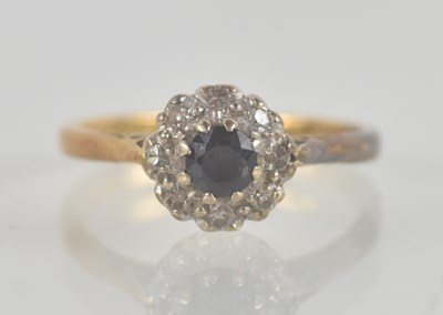 Lot 1342 - An 18ct yellow gold diamond and sapphire set...