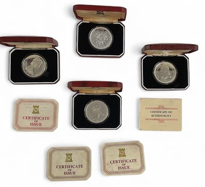 Lot 1576 - POPJOY MINT; four silver commemorative crowns...