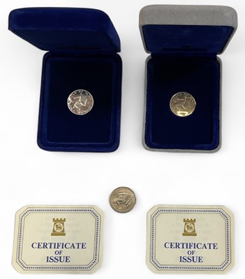 Lot 1587 - POPJOY MINT; three Isle of Man one pound proof...