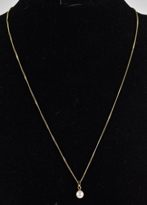 Lot 1414 - A 9ct yellow gold dainty necklace with ring...