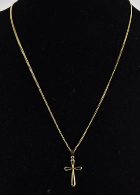 Lot 1395 - A 9ct yellow gold cross pendant, length 2.1cm,...