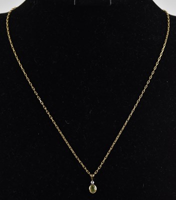 Lot 1406 - A 9ct yellow gold dainty necklace, with ring...