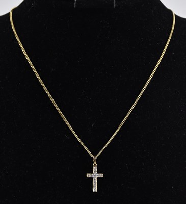 Lot 1413 - A 9ct yellow gold dainty necklace with ring...