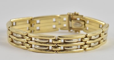 Lot 1447 - A 9ct yellow gold three bar gate bracelet,...