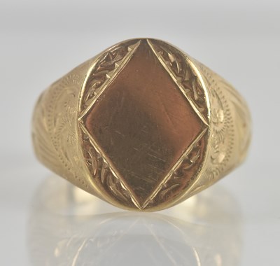 Lot 1319 - A 9ct yellow gold signet ring, with oval table,...