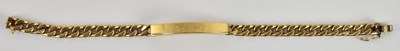 Lot 1453 - A 9ct yellow gold identity bracelet, with a...