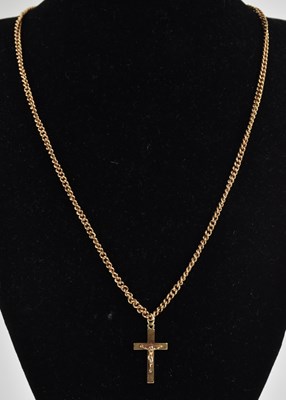 Lot 1381 - A 9ct yellow gold cross pendant, on a 9ct...