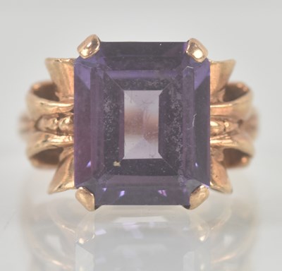 Lot 1337 - A 9ct rose gold dress ring with claw set...