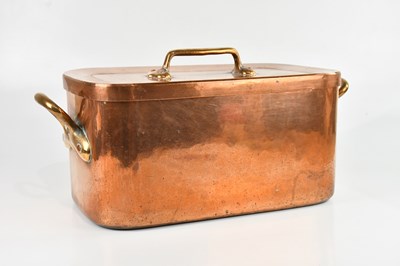 Lot 1168 - A large copper and brass twin handled lidded...