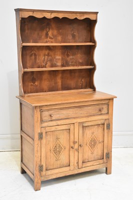 Lot 138 - A reproduction small oak dresser with single...