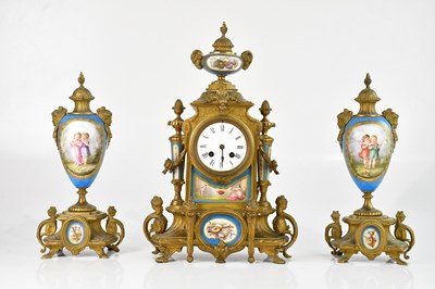 Lot 199 - A late 19th century bronze and porcelain three...