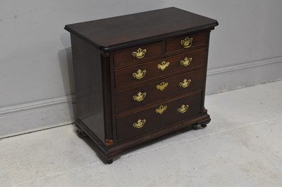 Lot 2033 - An early 19th century mahogany chest of two...