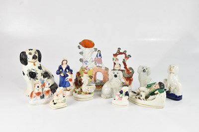 Lot 1113 - STAFFORDSHIRE; a collection of figures, models...