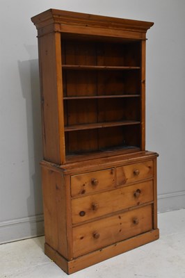 Lot 102 - An old pine dresser with three fixed shelves...