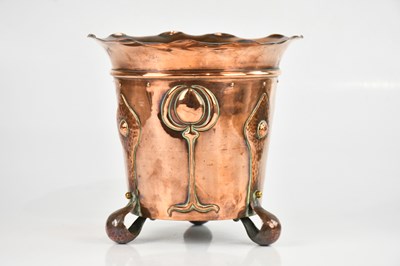 Lot 1403 - An Arts and Crafts copper log bin, repousse...