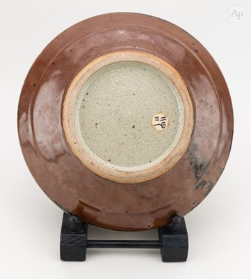 Lot 650 - SHINSAKU HAMADA (1929-2023) a stoneware dish...