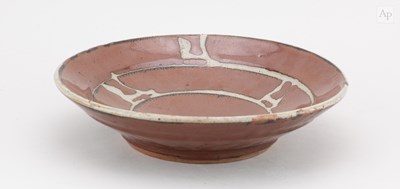 Lot 650 - SHINSAKU HAMADA (1929-2023) a stoneware dish...