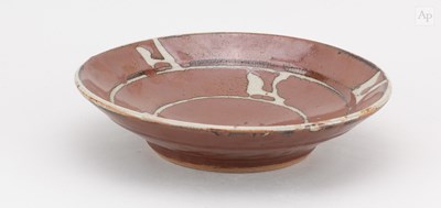 Lot 650 - SHINSAKU HAMADA (1929-2023) a stoneware dish...