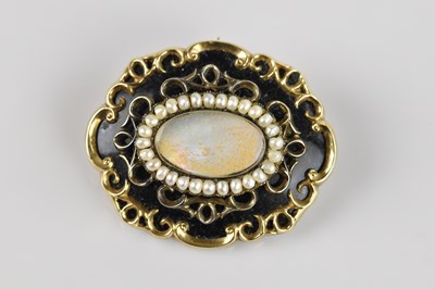 Lot 1298 - A Victorian yellow metal black enamel mother...