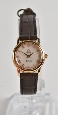 Lot 1615 - OMEGA; a lady's 18ct gold 'Prestige De Ville'...