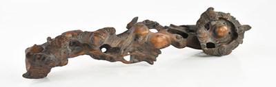 Lot 1605 - A Chinese carved rootwood ruyi sceptre, carved...