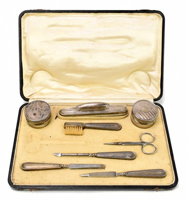 Lot 1191 - A cased George V part manicure set