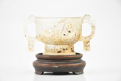 Lot 1618 - A Chinese rock crystal effect twin handled...