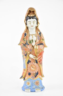 Lot 1703 - A Japanese Satsuma figure of Guanyin, with...