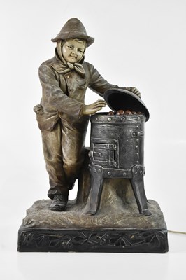 Lot 1379 - An Austrian ceramic figural lamp in the manner...