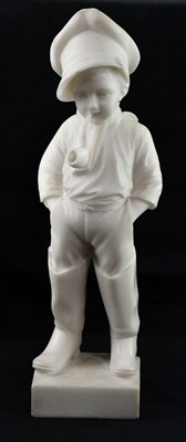 Lot 1221 - A carved alabaster model of a boy smoking a...