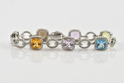 Lot 1141 - A white metal diamond and multigem set...