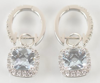 Lot 1425 - A pair of 18ct white gold diamond and...