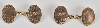 Lot 1435 - A pair of yellow metal oval faced cufflinks,...