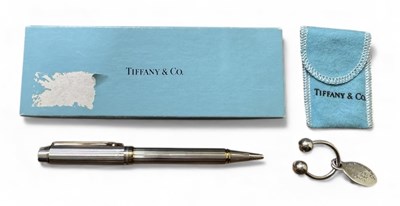 Lot 1472 - TIFFANY & CO; a 925 silver keyring and a...