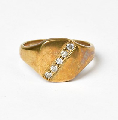 Lot 823 - A 9ct gold signet ring set with five small...