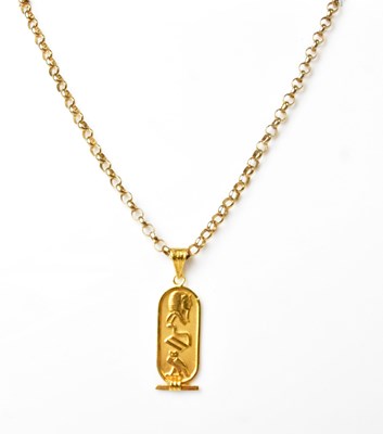 Lot 912 - An Egyptian yellow metal pendant, length 4cm,...