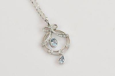 Lot 2177 - A 9ct white gold diamond and aquamarine set...