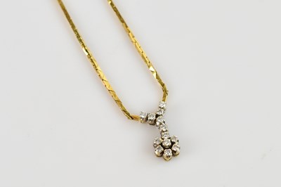 Lot 2065 - An 18ct yellow and white gold diamond set...