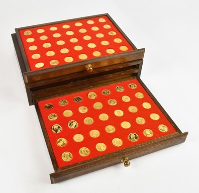 Lot 1121 - A set of seventy silver gilt coins, 'Our Royal...