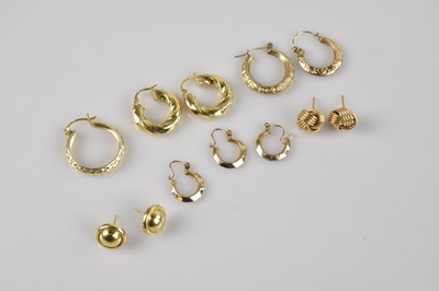 Lot 1383 - A collection of yellow metal earrings,...