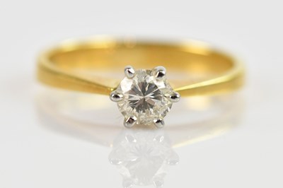 Lot 2521 - A yellow metal diamond set solitaire ring,...