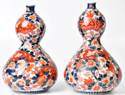Lot 189 - A pair of Japanese Imari pattern double gourd...