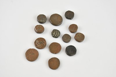 Lot 1145 - A small collection of Middle Eastern copper...