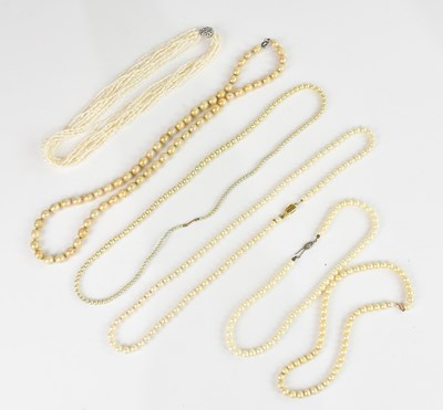 Lot 1051 - Five simulated pearl necklaces and freshwater...