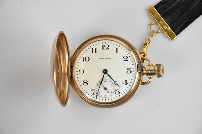 Lot 405 - WALTHAM; a 9ct yellow gold crown wind full...