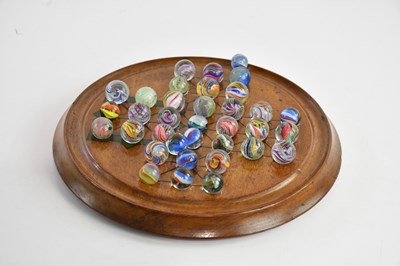 Lot 1113 - A 19th century solitaire board, with a...