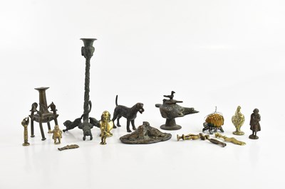 Lot 1229 - A collection of Eastern and Benin bronze and...